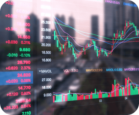 obraz ekranu giełdowego z miastem w tle.